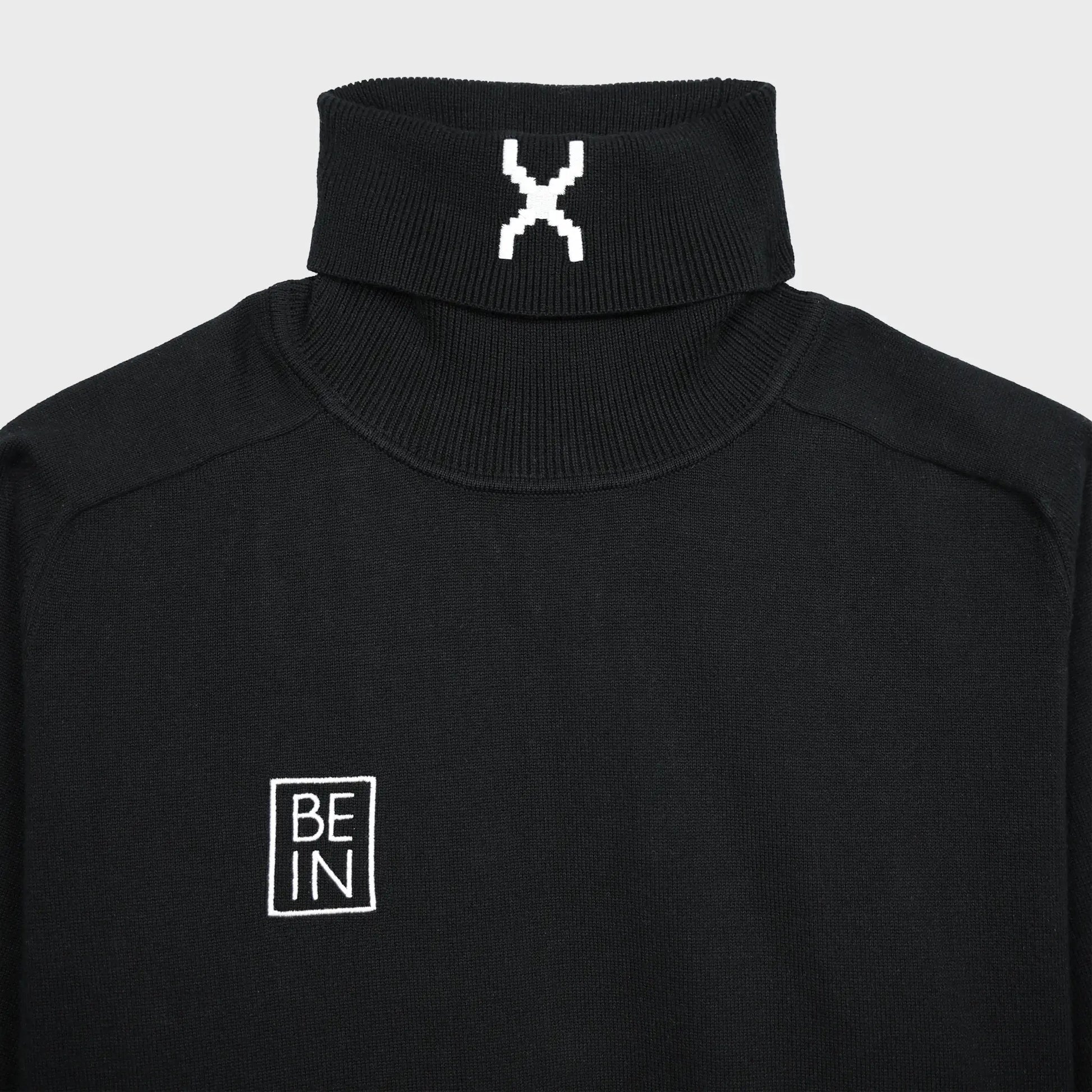 "X" Turtleneck